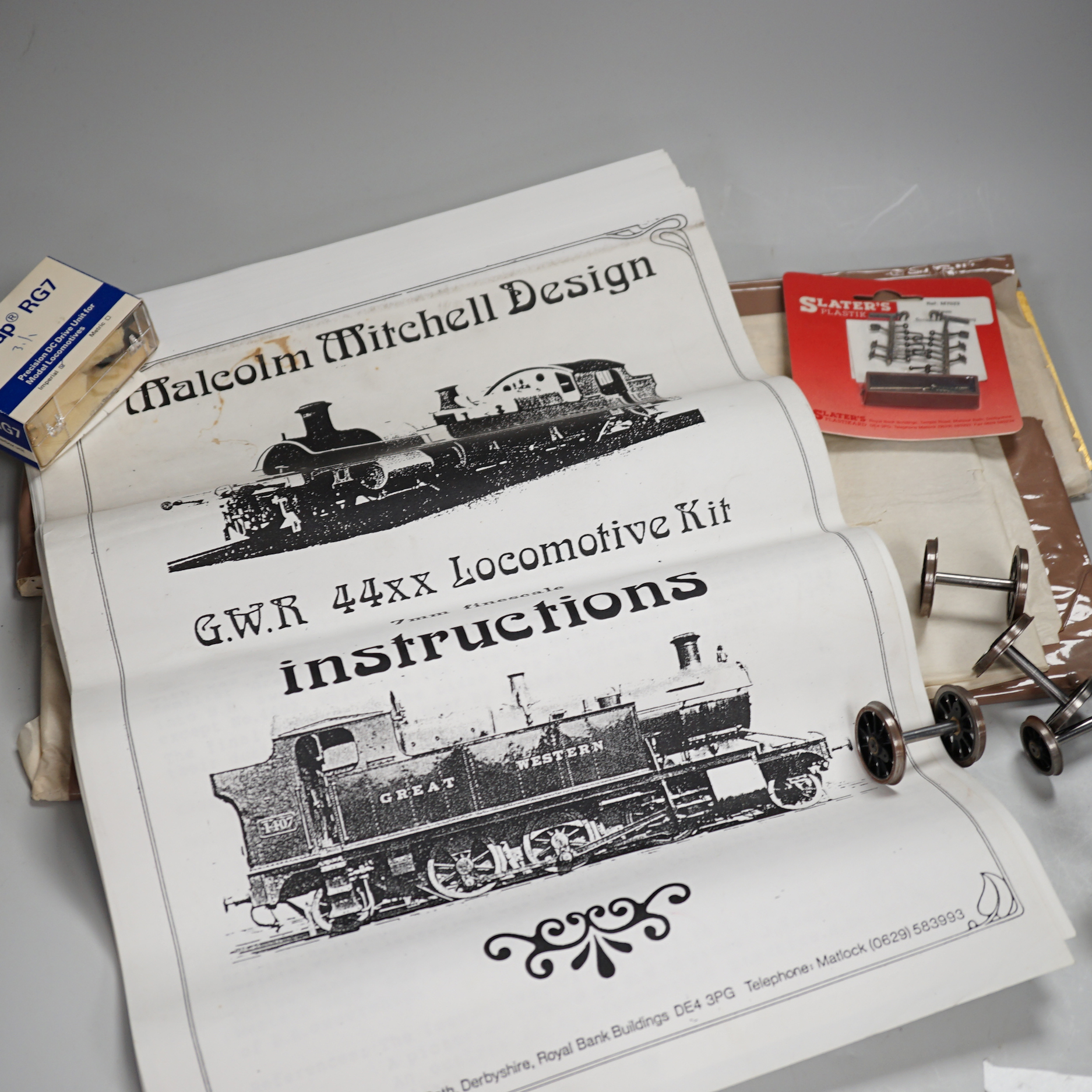 A Malcolm Mitchell Design 7mm scale 0 gauge GWR Class 44xx brass railway locomotive unconstructed kit with instructions etc, including an Escap RG7 DC motor, wheels, etc, boxed